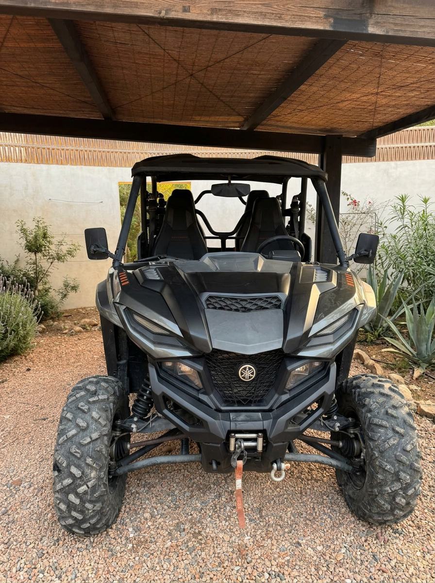 Front three-quarter view of the four-seat Yamaha off-road buggy with roll cage and rugged tyres at the Ibiza villa