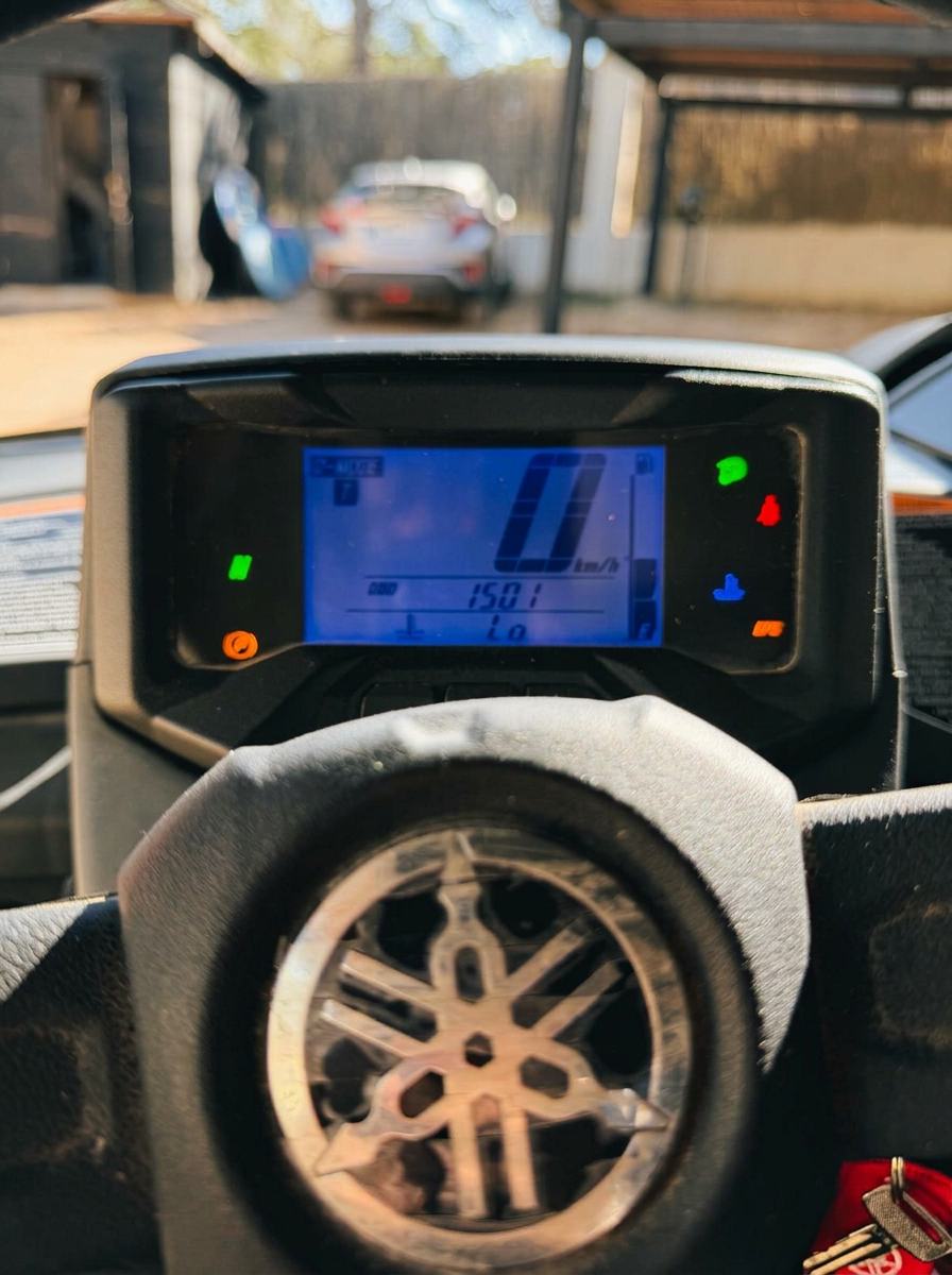 Close-up of the Yamaha Wolverine buggy dashboard and digital instrument display