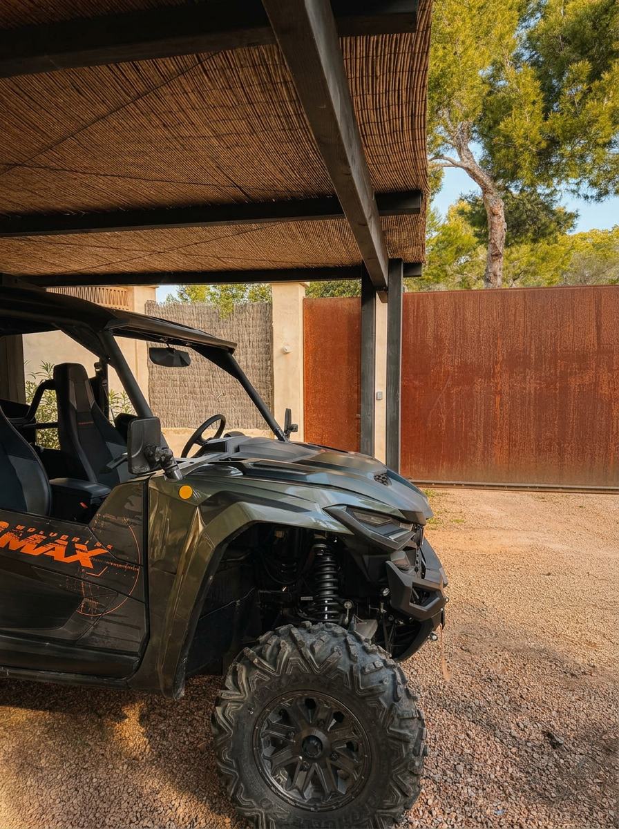 Side-front view showing the Yamaha buggy's off-road tyres, suspension and protective roll cage