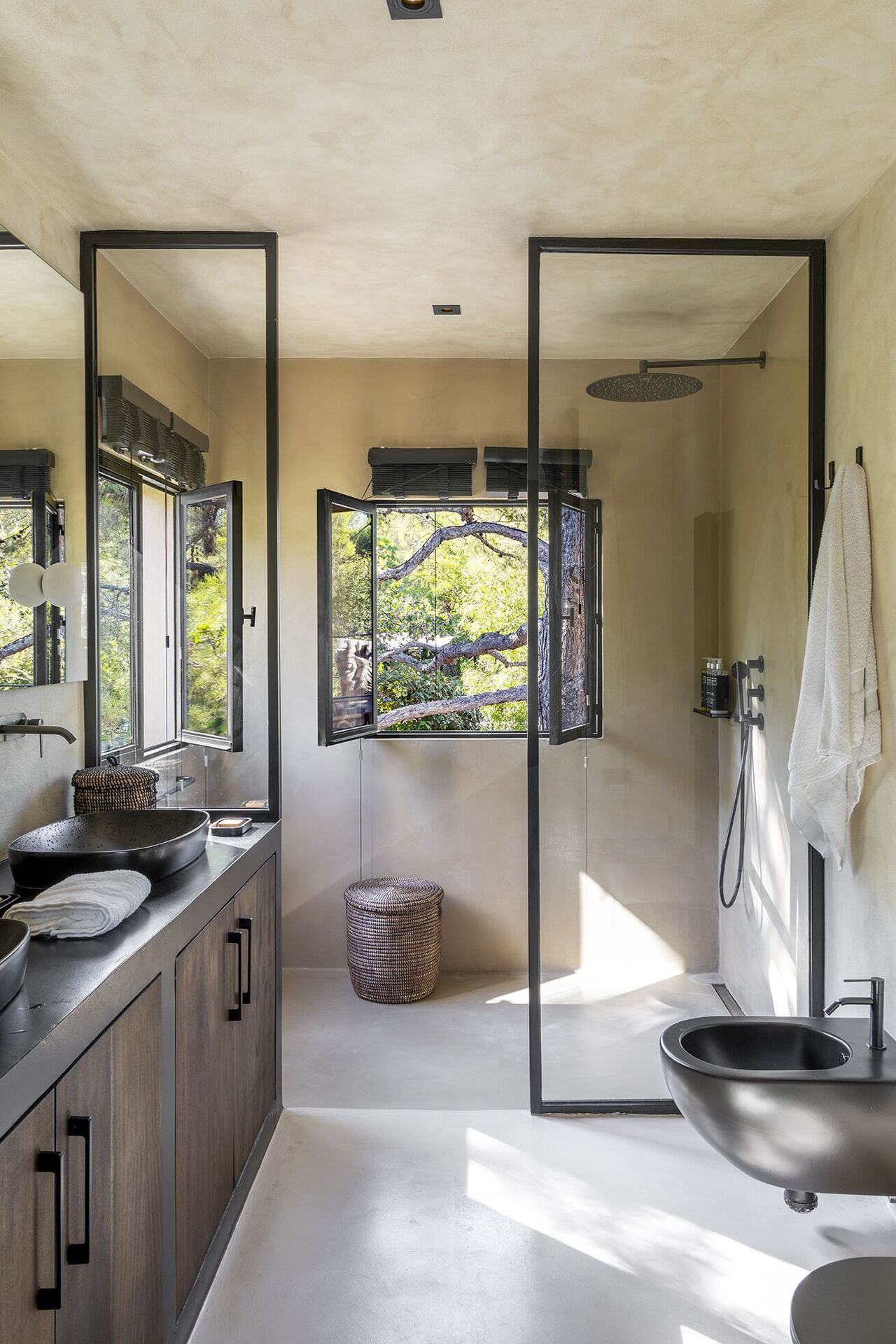 Open ensuite bathroom with rain shower