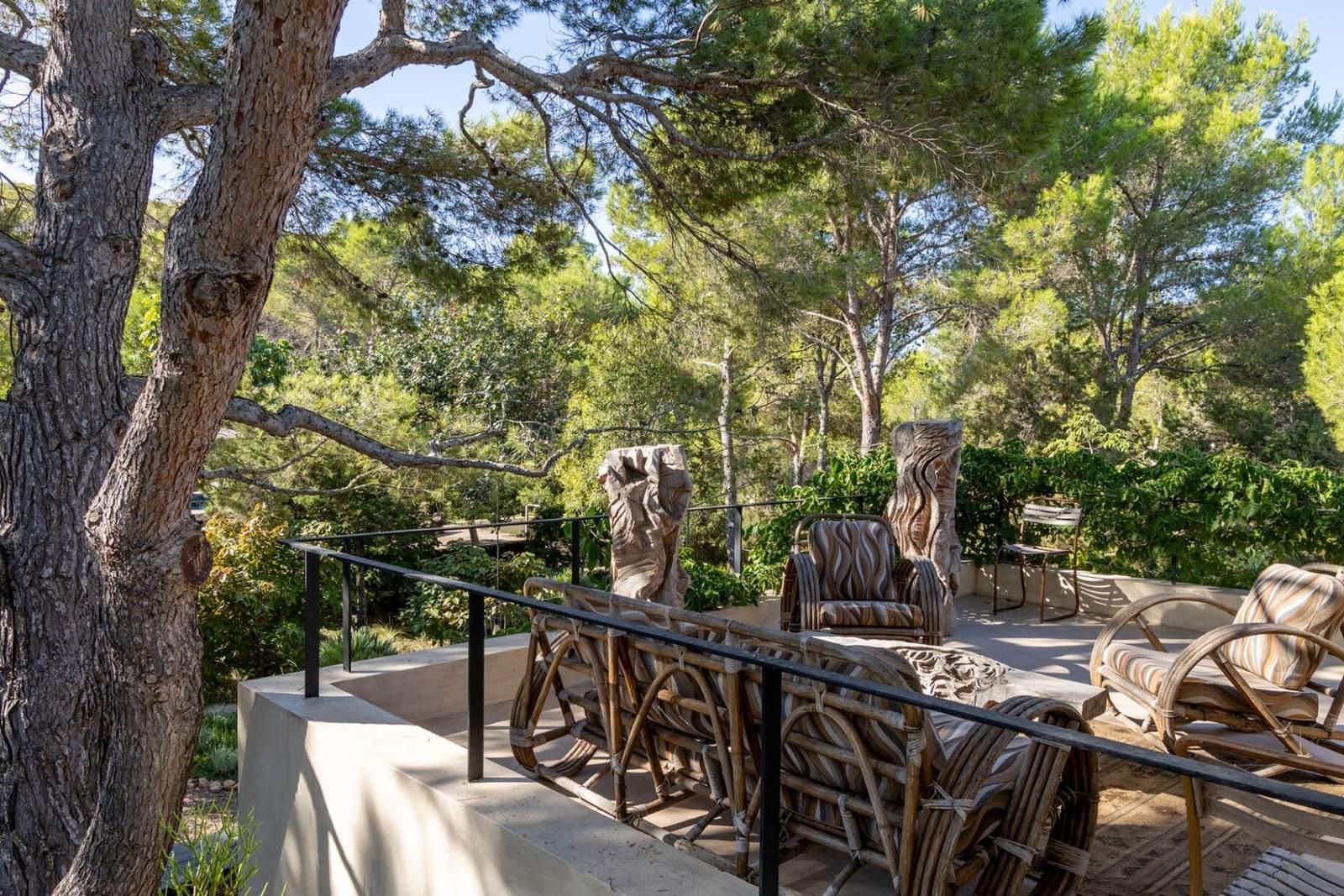 Rattan lounge chairs on the terrace