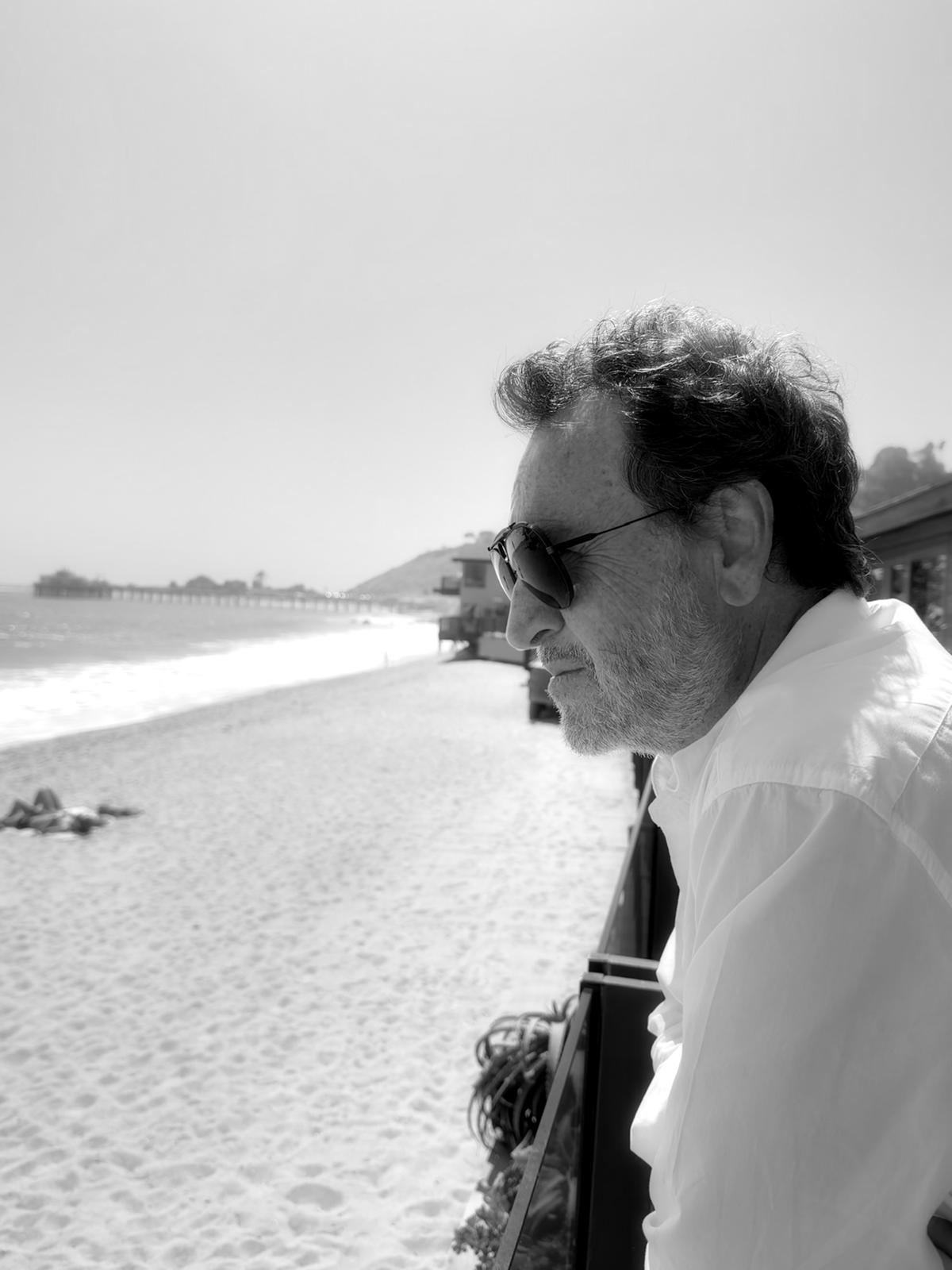 Olivier on a terrace overlooking the bay