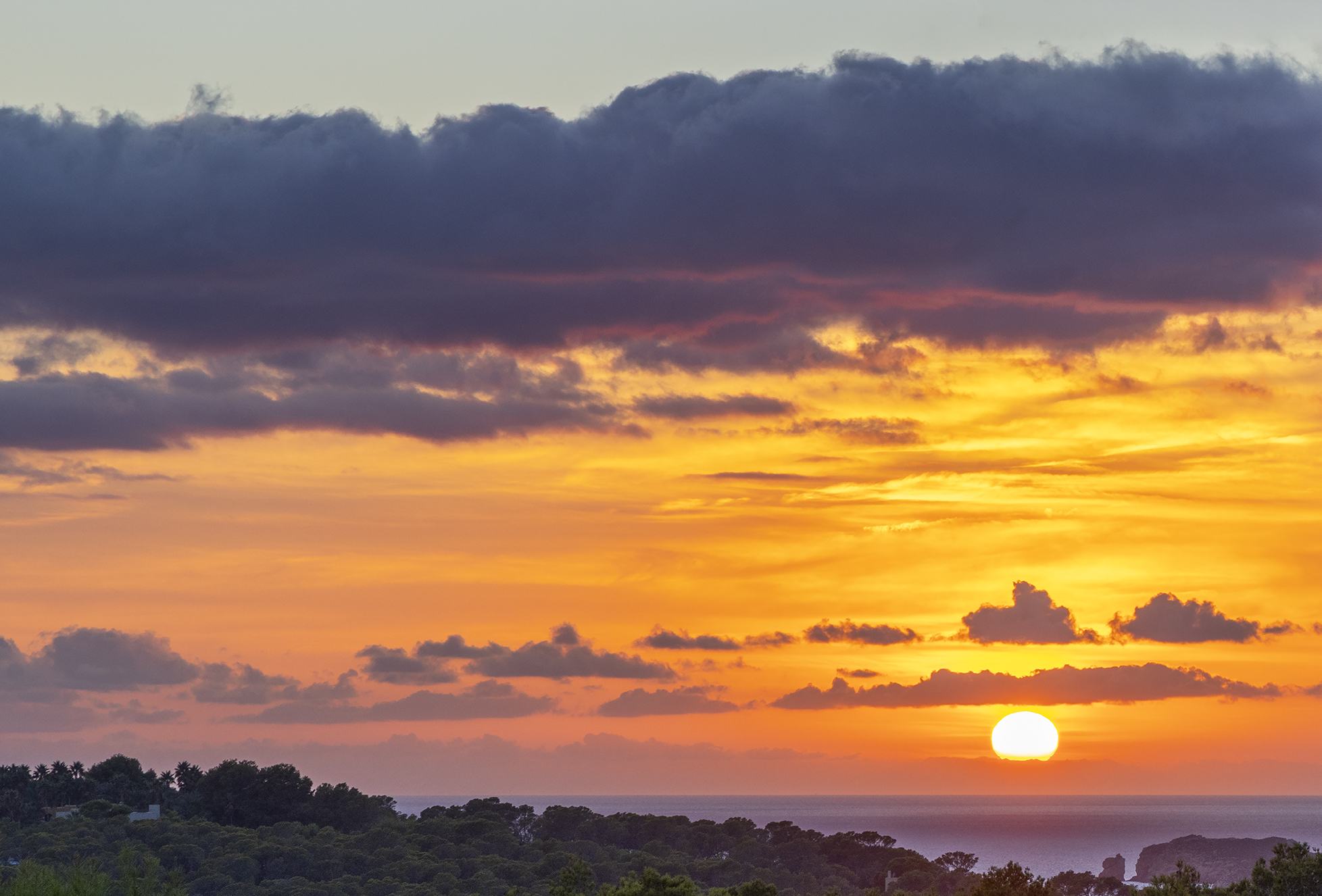 Cloud-streaked sunset over the Mediterranean from the property